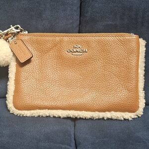 Coach Tan Pebbled Leather Cream Sherpa Wristlet